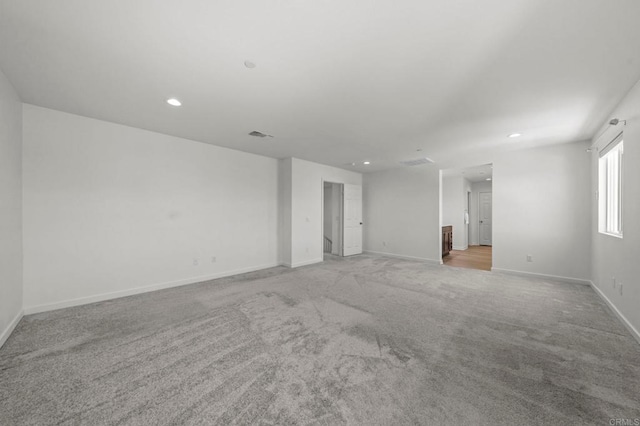 28339 Levi Way, Menifee, CA 92585 - empty room with light carpet and recessed lighting