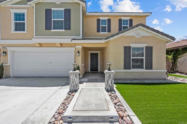 28339 Levi Way, Menifee, CA 92585 - view of front of home featuring a garage, concrete driveway, stucco siding, and a front lawn