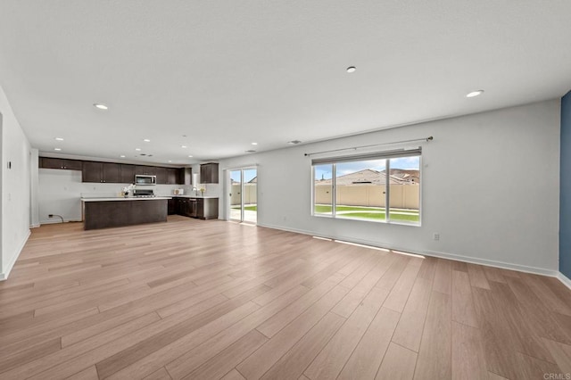 28339 Levi Way, Menifee, CA 92585 - unfurnished living room with recessed lighting and light wood-style floors