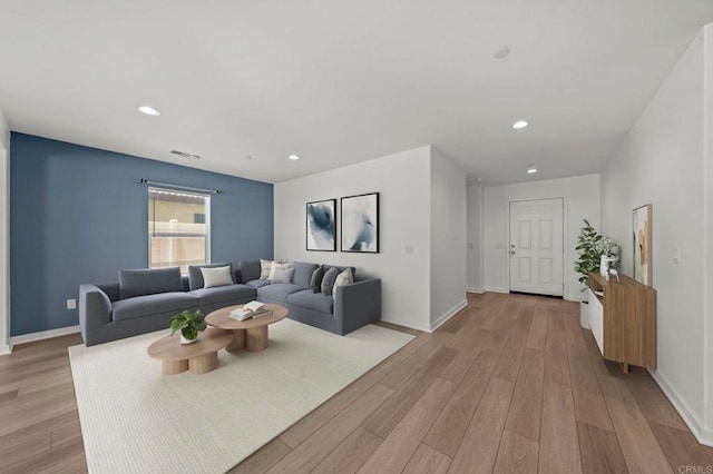 28339 Levi Way, Menifee, CA 92585 - living area featuring light wood-style floors and recessed lighting
