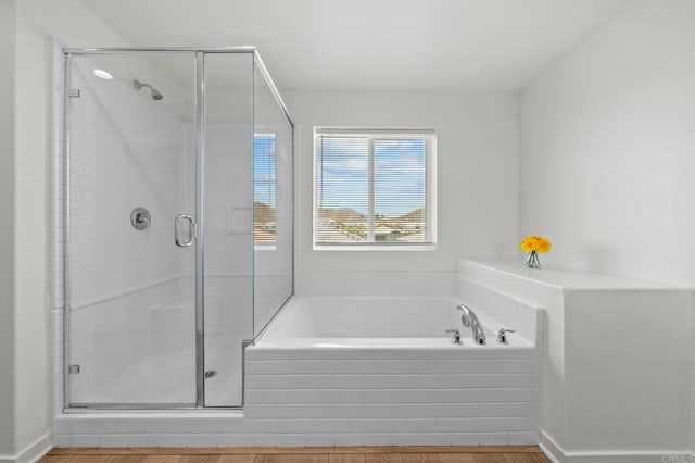 28339 Levi Way, Menifee, CA 92585 - full bathroom featuring a bath, a shower stall, and wood finished floors
