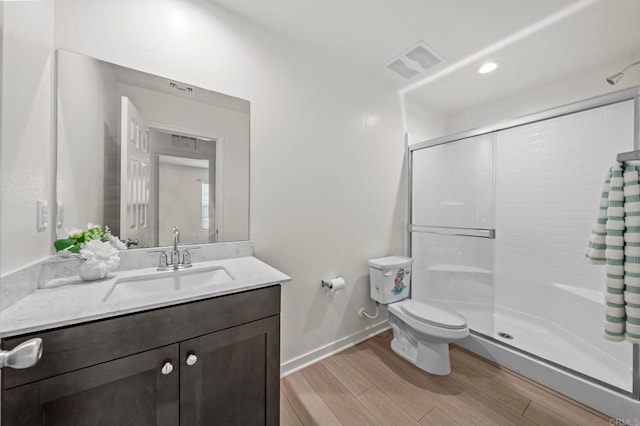 28339 Levi Way, Menifee, CA 92585 - bathroom featuring vanity, a stall shower, and wood finished floors