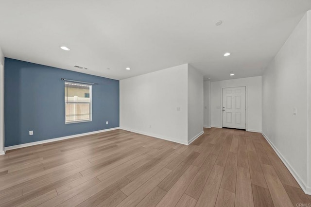 28339 Levi Way, Menifee, CA 92585 - empty room with wood finished floors and recessed lighting
