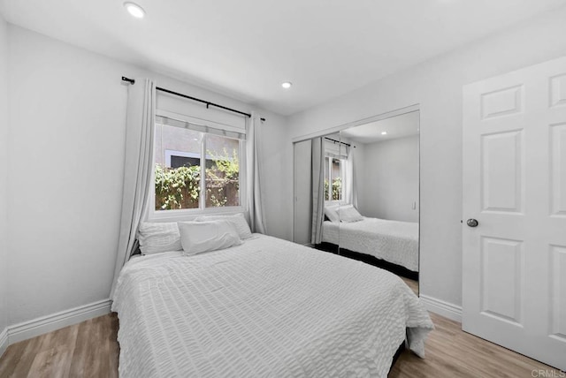 7971 Jade Coast Rd, San Diego, CA 92126 - bedroom featuring wood finished floors, a closet, and recessed lighting
