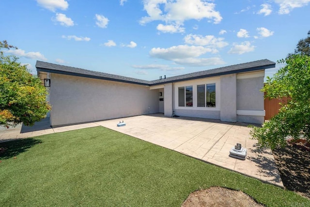 7971 Jade Coast Rd, San Diego, CA 92126 - rear view of property with a patio area, stucco siding, and a lawn