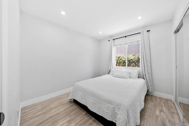7971 Jade Coast Rd, San Diego, CA 92126 - bedroom featuring wood finished floors, a closet, and recessed lighting
