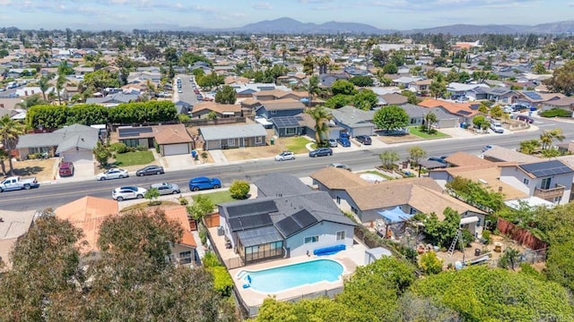 7971 Jade Coast Rd, San Diego, CA 92126 - aerial perspective of suburban area with a mountain backdrop and a pool area