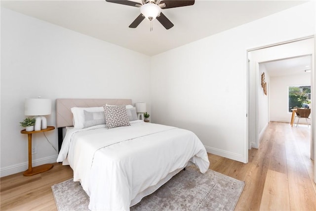 2283 Gaviota Ave, Signal Hill, CA 90755 - bedroom featuring light wood finished floors and ceiling fan