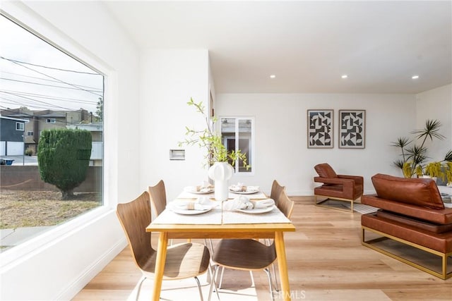 2283 Gaviota Ave, Signal Hill, CA 90755 - dining area featuring light wood finished floors and recessed lighting