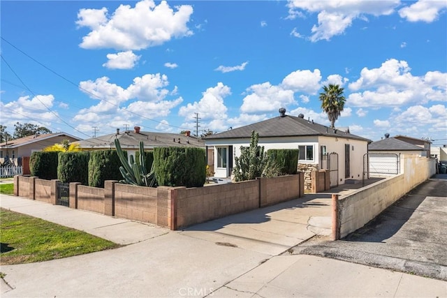 2283 Gaviota Ave, Signal Hill, CA 90755 - single story home with a fenced front yard, a gate, stucco siding, and stone siding