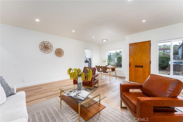 2283 Gaviota Ave, Signal Hill, CA 90755 - living room with healthy amount of natural light, light wood finished floors, and recessed lighting