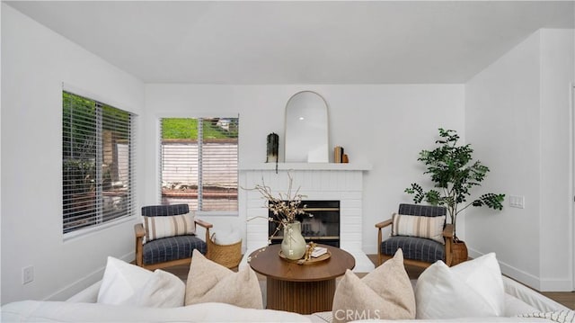 19081 Wildwood Cir, Lake Forest, CA 92679 - living room with a brick fireplace and wood finished floors