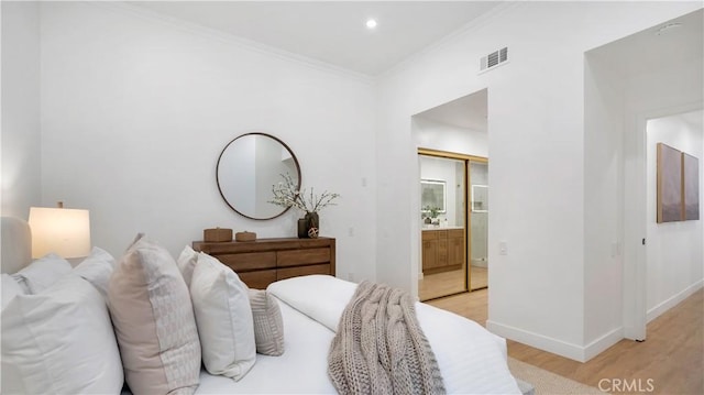 19081 Wildwood Cir, Lake Forest, CA 92679 - bedroom featuring light wood-type flooring, crown molding, connected bathroom, and recessed lighting