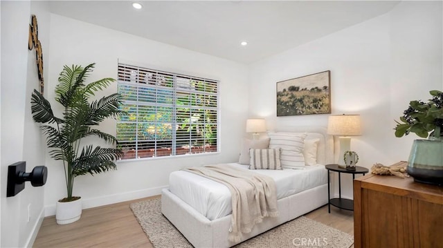 19081 Wildwood Cir, Lake Forest, CA 92679 - bedroom featuring light wood-style flooring and recessed lighting