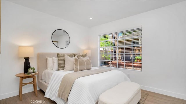 19081 Wildwood Cir, Lake Forest, CA 92679 - bedroom featuring light wood-type flooring and recessed lighting