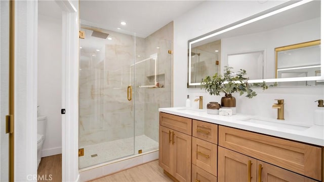 19081 Wildwood Cir, Lake Forest, CA 92679 - full bath featuring double vanity, a stall shower, wood finished floors, and recessed lighting