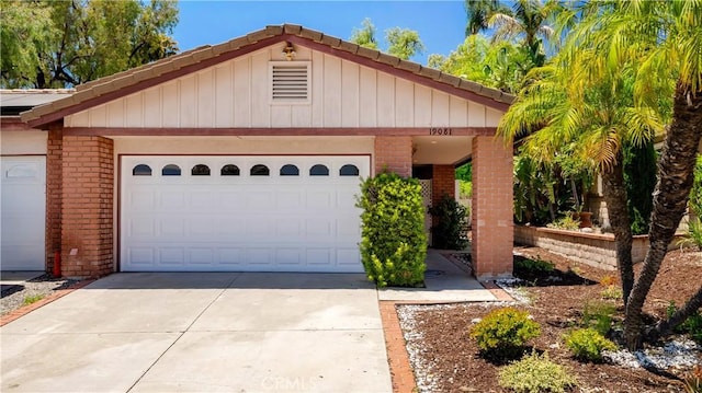 19081 Wildwood Cir, Lake Forest, CA 92679 - ranch-style house with brick siding, driveway, and an attached garage
