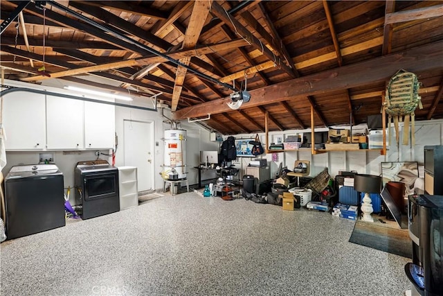 11243 Gaviota Ave, Granada Hills, CA 91344 - garage featuring washing machine and clothes dryer, secured water heater, and wooden ceiling