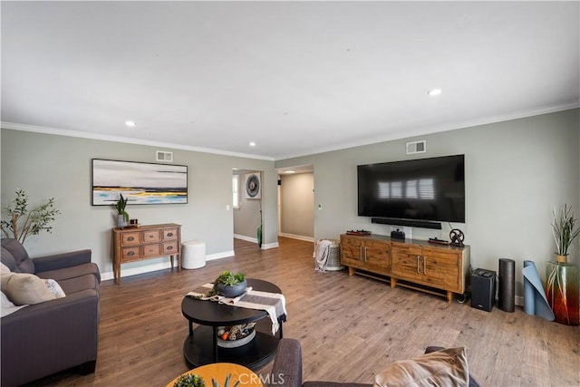 11243 Gaviota Ave, Granada Hills, CA 91344 - living room featuring recessed lighting, wood finished floors, and ornamental molding