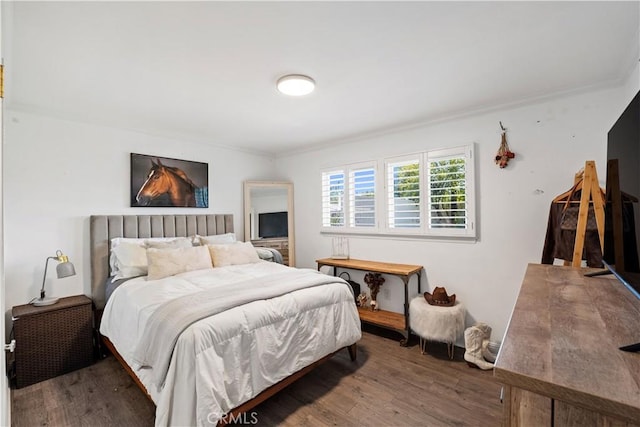 11243 Gaviota Ave, Granada Hills, CA 91344 - bedroom with wood finished floors and ornamental molding