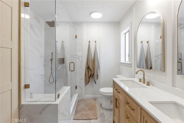 2151 Stonefield Pl, Riverside, CA 92506 - bathroom featuring a marble finish shower and double vanity
