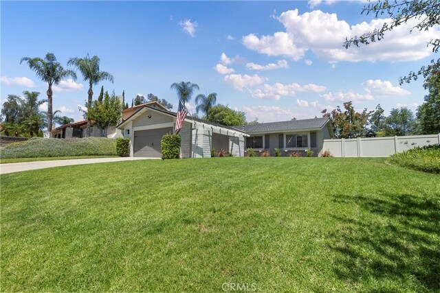 2151 Stonefield Pl, Riverside, CA 92506 - view of front facade featuring a garage and driveway