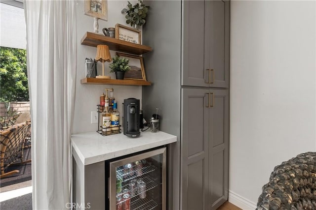 2151 Stonefield Pl, Riverside, CA 92506 - indoor dry bar with beverage cooler and baseboards