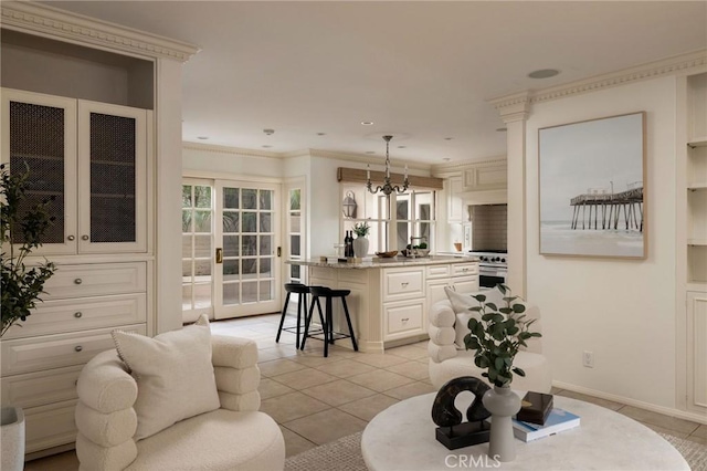 816 Via Lido Nord, Newport Beach, CA 92663 - living room featuring light tile patterned floors, french doors, and ornamental molding