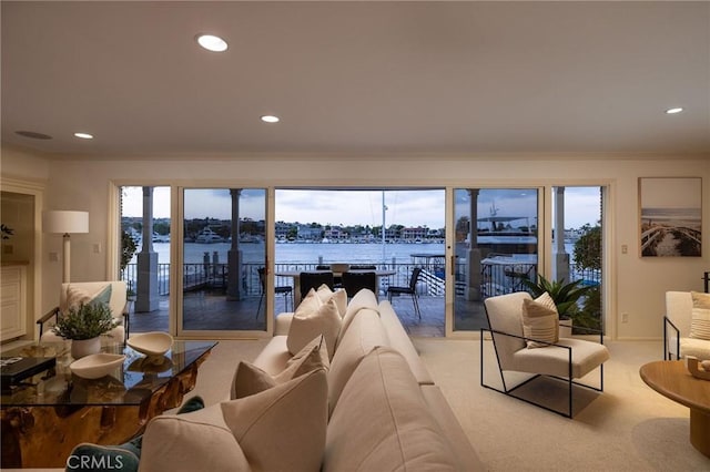 816 Via Lido Nord, Newport Beach, CA 92663 - living area with recessed lighting, crown molding, a water view, light carpet, and healthy amount of natural light