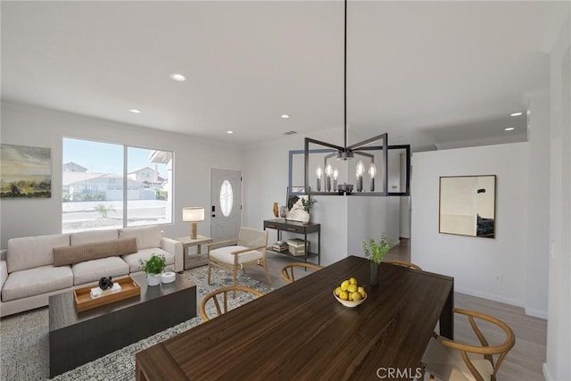 11490 Autumn St, Adelanto, CA 92301 - dining space featuring recessed lighting, wood finished floors, and a chandelier