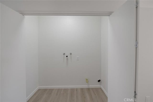 11490 Autumn St, Adelanto, CA 92301 - laundry room with light wood-style flooring and washer hookup