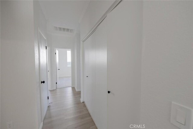 11490 Autumn St, Adelanto, CA 92301 - hallway with light wood finished floors