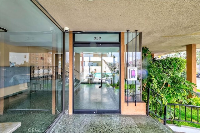358 S Gramercy Pl Unit 201, Los Angeles, CA 90020 - property entrance featuring a security system