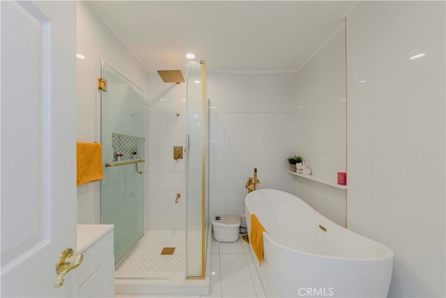 358 S Gramercy Pl Unit 201, Los Angeles, CA 90020 - full bathroom with a stall shower, tile patterned flooring, a freestanding bath, and tile walls