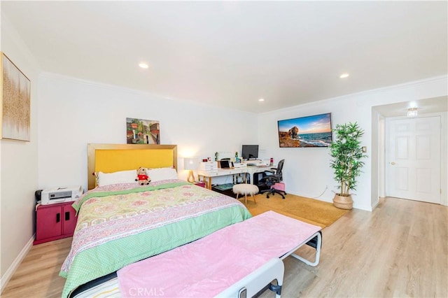 358 S Gramercy Pl Unit 201, Los Angeles, CA 90020 - bedroom featuring light wood-style flooring, crown molding, recessed lighting, and an office area