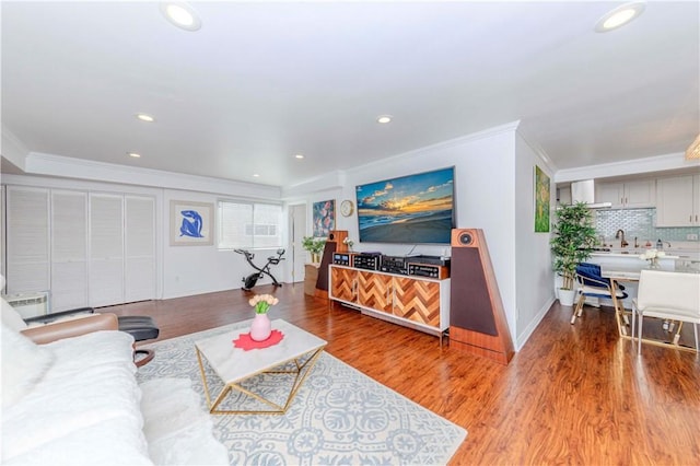 358 S Gramercy Pl Unit 201, Los Angeles, CA 90020 - living room featuring crown molding, wood finished floors, and recessed lighting