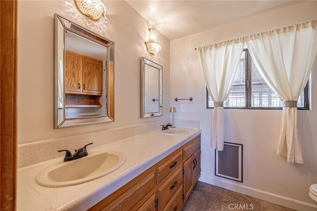 14320 Kiptree Dr, Lake Hughes, CA 93532 - bathroom with double vanity and tile patterned floors