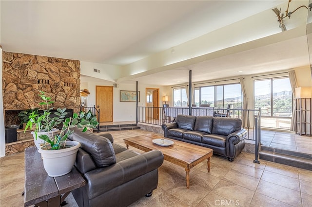 14320 Kiptree Dr, Lake Hughes, CA 93532 - living room featuring healthy amount of natural light and light tile patterned floors