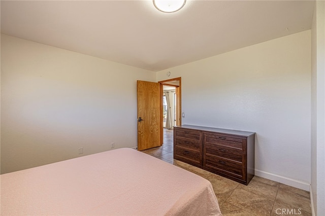 14320 Kiptree Dr, Lake Hughes, CA 93532 - bedroom featuring light tile patterned floors and baseboards