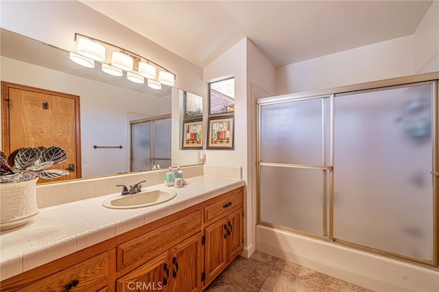 14320 Kiptree Dr, Lake Hughes, CA 93532 - bathroom featuring vanity and bath / shower combo with glass door