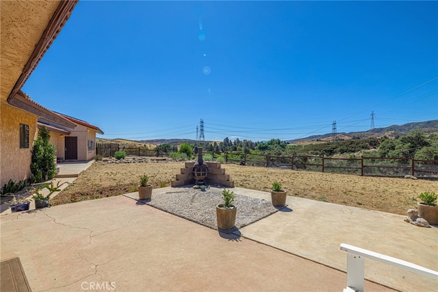 14320 Kiptree Dr, Lake Hughes, CA 93532 - fenced backyard with a patio