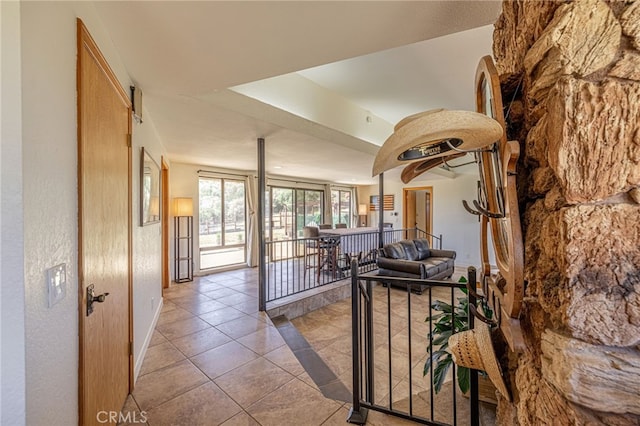 14320 Kiptree Dr, Lake Hughes, CA 93532 - hallway featuring baseboards and tile patterned floors
