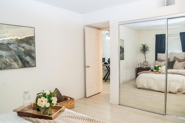 12191 Cuyamaca College Dr E Unit 703, San Diego, CA 92019 - bedroom with light wood finished floors and a closet