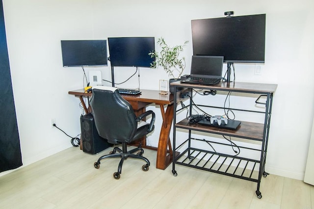 12191 Cuyamaca College Dr E Unit 703, San Diego, CA 92019 - office area featuring wood finished floors and baseboards