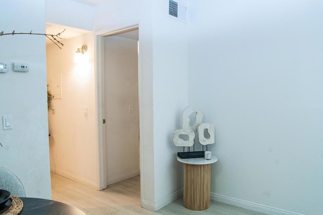 12191 Cuyamaca College Dr E Unit 703, San Diego, CA 92019 - bathroom with baseboards and wood finished floors