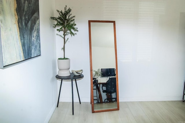 12191 Cuyamaca College Dr E Unit 703, San Diego, CA 92019 - corridor featuring wood finished floors and baseboards