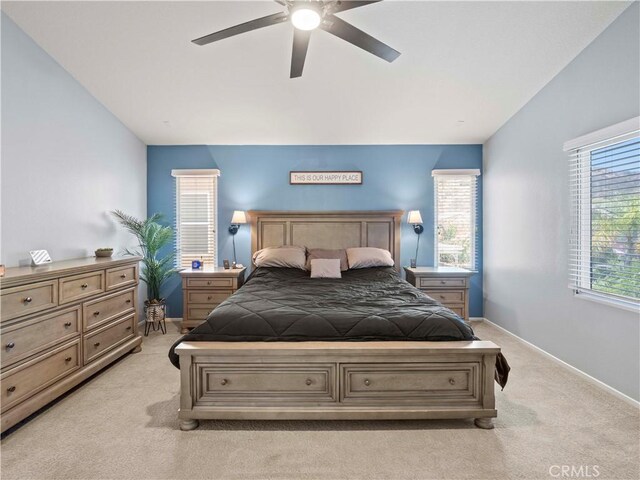 28323 Roman Ct, Saugus, CA 91350 - bedroom featuring light colored carpet, vaulted ceiling, and a ceiling fan