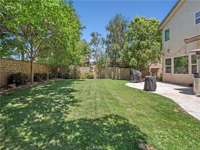 28323 Roman Ct, Saugus, CA 91350 - fenced backyard featuring a patio