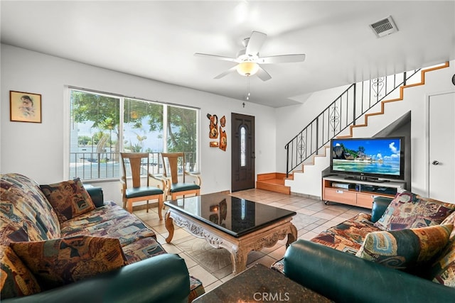 429 E Providencia Ave Unit B, Burbank, CA 91501 - living room with light tile patterned flooring, stairway, and ceiling fan