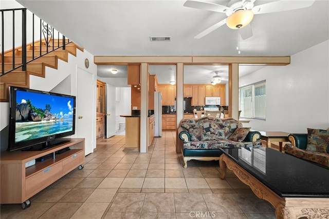 429 E Providencia Ave Unit B, Burbank, CA 91501 - living room featuring a ceiling fan, light tile patterned flooring, and stairway